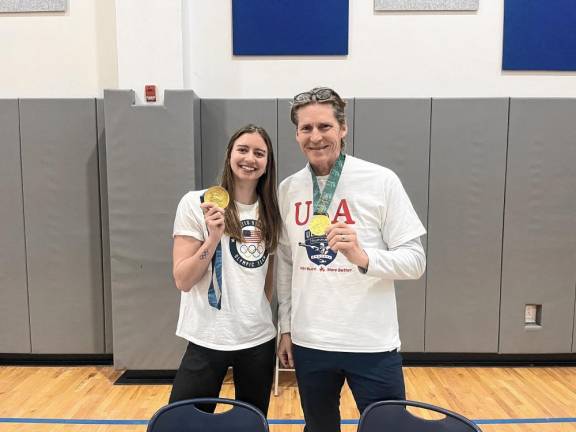 OLY2 Kate Douglass, a 2024 Olympic champion in the 200-meter breaststroke, and Josh Davis, a gold medalist in the 1992 and 1996 Olympics.