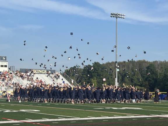 Members of the Vernon Township High School Class of 2024 toss their caps in the air at the end of graduation Wednesday, June 19. (Photo by Theresa Sabia)