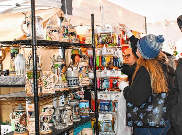 <b>GM1 People shop at the German Christmas Market of New Jersey on Saturday, Dec. 7 at the Sussex County Fairgrounds in Augusta. (Photos by Maria Kovic)</b>