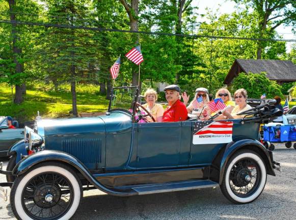 Members of the Hopatcong Woman’s Club ride in the parade. (Photo by Maria Kovic)