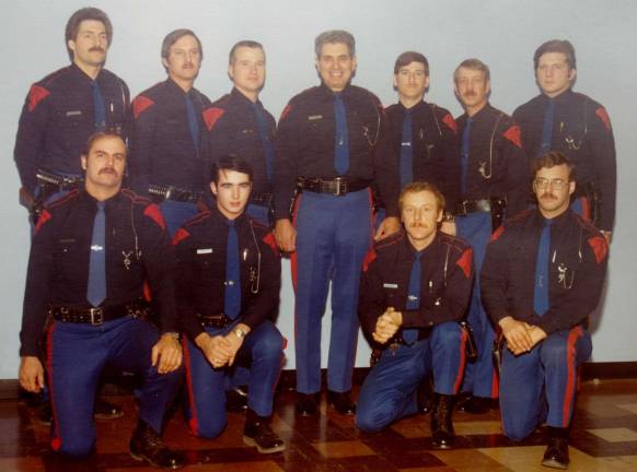 Photo by Chris Wyman A photograph of the Vernon Police Department circa 1975. The original officers of the Vernon Police Department were: Chief Angelo Esposito, George Dolak, Bob Helmrich, Ken Itjen, Ken Johnson, John &#xec;Kaz&#xee; Kazmierczak, Jack King, Steve O&#xed;Conor, John Volosin, Roy Wherry, and Wally Wootton. In the photo, Wherry is shown kneeling at the far right.