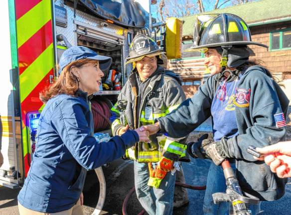 New York Gov. Kathy Hochul talks to firrefighters battling the Jennings Creek Wildfire in Greenwood Lake on Tuesday, Nov. 12. (Photo by Susan Watts/Office of Governor Kathy Hochul)