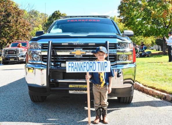 Forrest Grover leads the Frankford Township contingent in the parade.