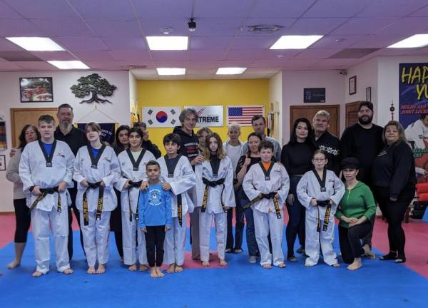 7 get black belts in Taekwondo