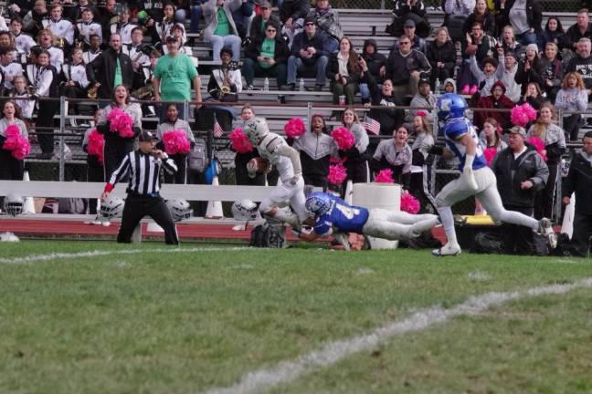 Wallkill Valley wide receiver Anthony Sgroi is tackled by Kittatinny defender Jacob Savage along the sideline in the first half.