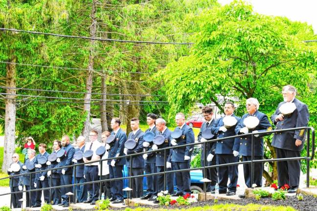 Franklin firefighters pay their respects to those who paid the ultimate price for our country. (Photo by Maria Kovic)