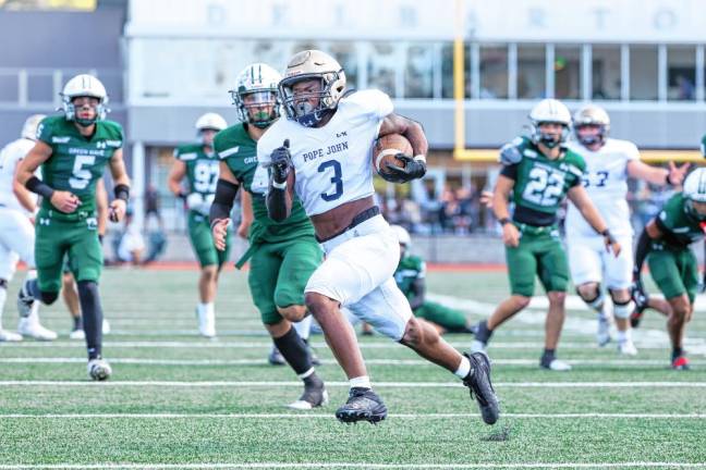 <b>Pope John’s Tylik Hill sprints toward the end zone on a first-quarter run in the game against Delbarton on Saturday, Oct. 5. Hill made three touchdowns, but the Lions lost, 35-34. (Photo by Glenn Clark)</b>