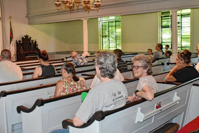 <b>The hot weather and un-airconditioned church meant a small audience for the sing-along, which was organized by Dori Martin, choral director at High Point Regional High School.</b>