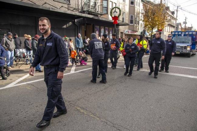 Members of Newton First Aid Squad march in the parade.