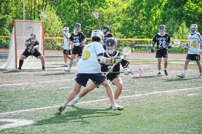 A Vernon Viking and a Delaware Valley Warrior face each other during their game Wednesday, May 8. Vernon lost, 15-10, at home. (Photos by George Leroy Hunter)