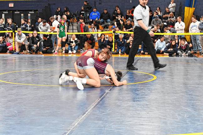 <b>Thiara Nunez of Leonia and Ingrid Vazquez of Passaic compete in the 100-pound weight class in the NJSIAA North Jersey, Section 1, District/Region championships Sunday, Feb. 23 at Vernon Township High School. </b>