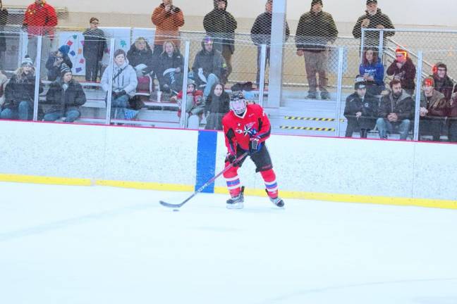 <b>A High Point/Wallkill Valley/Kittatinny hockey player moves on the ice.</b>