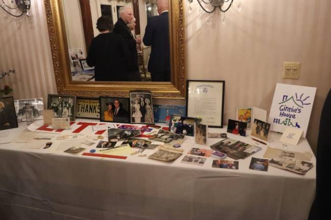 A table holds memorabilia about the life of Virginia ‘Ginnie’ Littell.