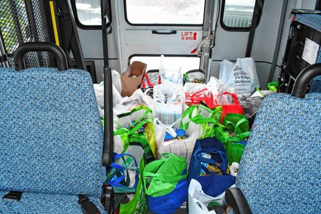 Donated food in the back of a Sussex County Skylands Ride bus.