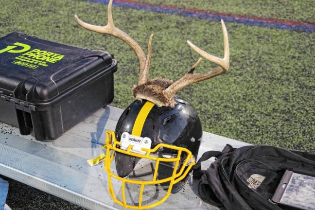 <b>A West Milford Highlander helmet is outfitted with antlers.</b>