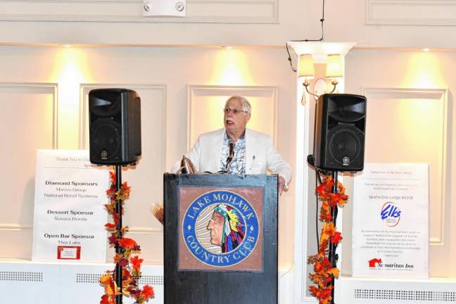 Alan Such, vice president of the Samaritan Inn’s board of directors, speaks at the fundraiser. The Newton-based nonprofit organization operates three shelters for homeless families and individuals.