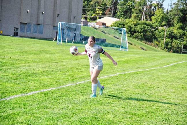 <b>Newton's Jolen Stoner is about to perform a throw-in.</b>