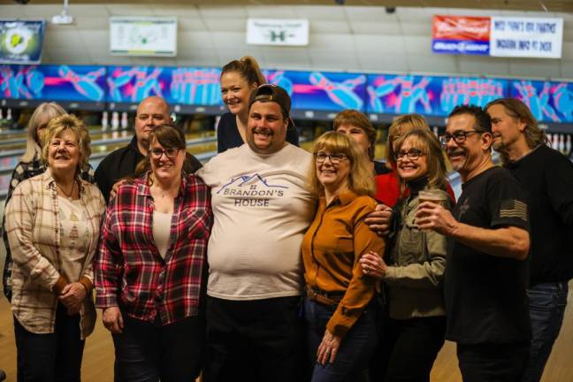 Brandon Bordt, third from left, poses with his co-workers from Stop &amp; Shop in Sparta.