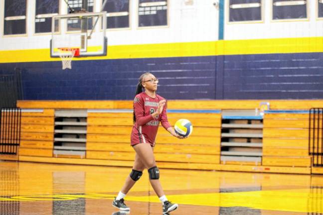 <b>Morristown-Beard's Raidah Karriem serves the ball.</b>