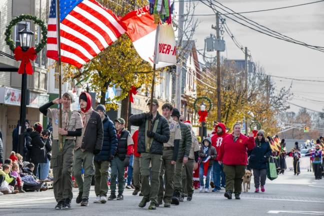 Boy Scout Troop 85 kicks off the parade.