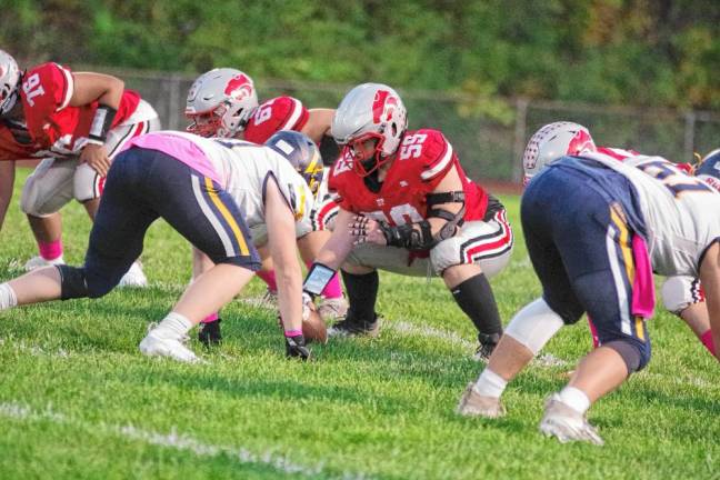 <b>High Point center Ryan Jaick (59) is ready to snap the ball in the first quarter. (Photo by George Leroy Hunter)</b>