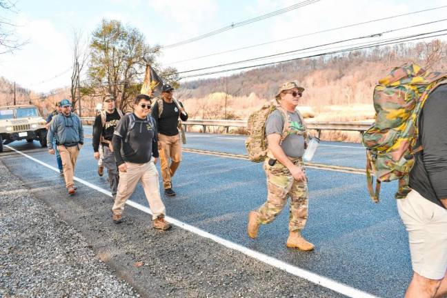 <b>Veterans march with rucksacks to the Wallkill Valley Veterans of Foreign Wars Post #8441 in Vernon for a Veterans Day ceremony and lunch Monday, Nov. 11. (Photos by Maria Kovic)</b>