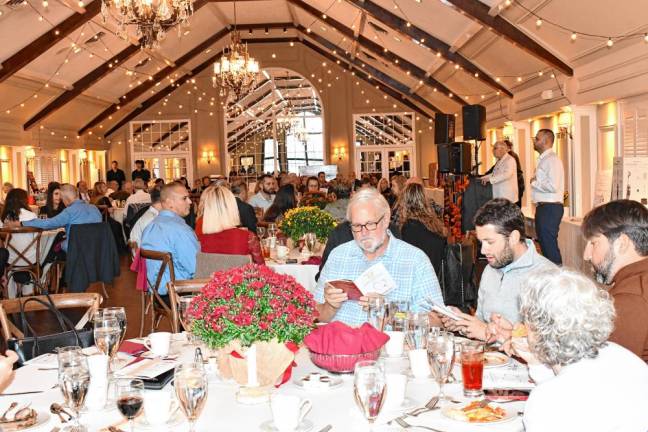 The Samaritan Inn’s 20th annual Grape Expectations fundraiser is held Sunday, Sept. 29 at the Lake Mohawk Country Club in Sparta. It included a wine tasting, silent and live auction, dinner and music. (Photos by Maria Kovic)