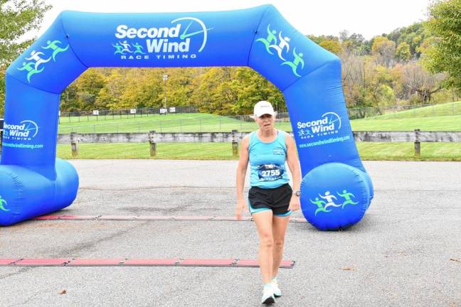 <b>Mary Bowman, 59, of Greenwood Lake, N.Y., is the second-fastest female (ninth overall) with a time of 23:14.</b>