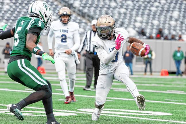 Pope John’s Tylik Hill makes a stutter step on a first-half run, as DePaul’s Marquet Dorsey tries to defend.