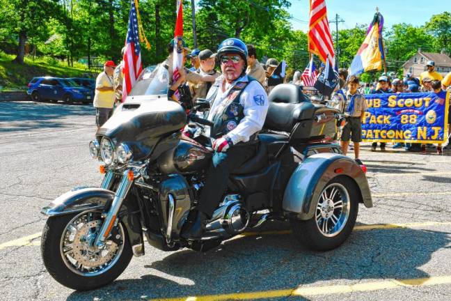 Len Pacella of the Blue Knights motorcycle club takes part in the Memorial Day parade on Saturday, May 25 in Hopatcong. (Photo by Maria Kovic)