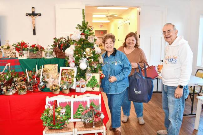 <b>Marie and Steve Sass of Franklin Lakes with Roseann Aliano, center, of Sparta.</b>