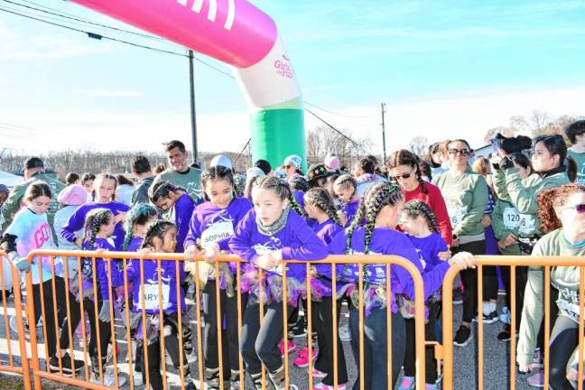 <b>Girls wait for the race to begin.</b>