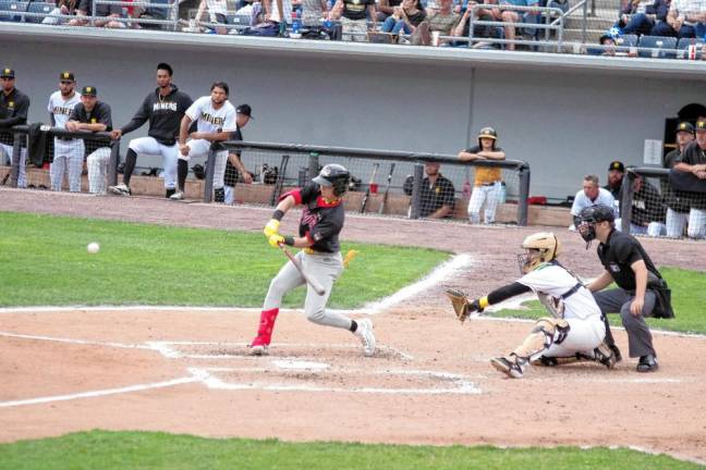 In the third inning, Tri-City ValleyCats batter Ryan Cash swings. He scored two runs.