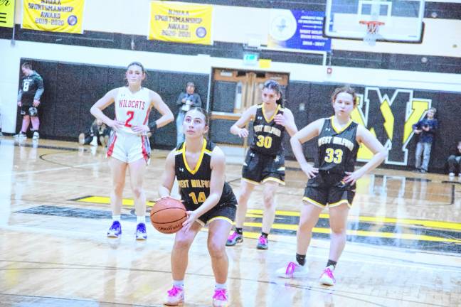 <b>West Milford's Sara Wardlaw holds the ball at the free throw line. She scored one point and grabbed two rebounds.</b>