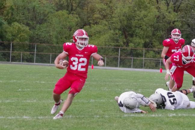 Lenape Valley ball carrier Ryan Stricchiola on the move in the first half. He scored one rushing touchdown in the game against Wallkill Valley.