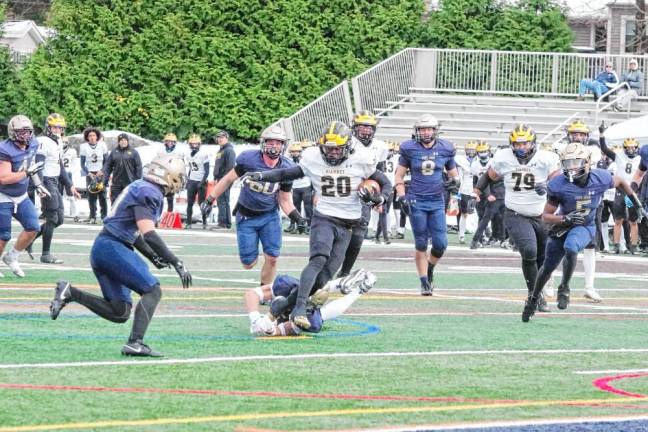 St. John Vianney ball carrier Abdul Turay on the move in the first half. Turay rushed for 189 yards and made one touchdown.