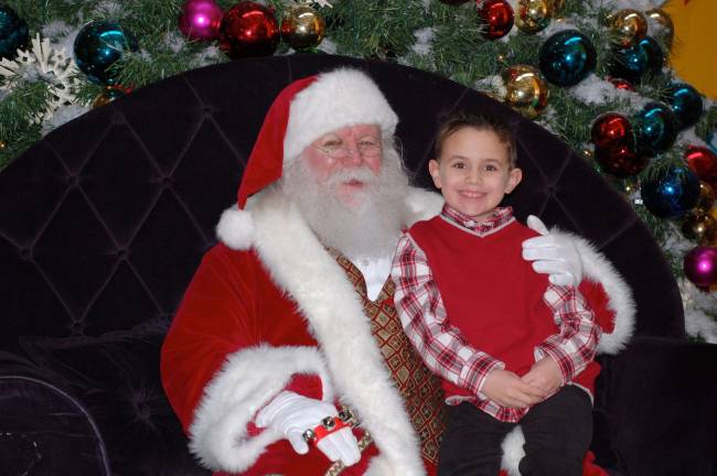 Submitted by: Michael Barbella of West Milford, N.J. &quot;Nicholas Barbella, 6, visits with jolly old St. Nicholas to discuss his 2013 Christmas wish list. Guess which list he's on?&quot;