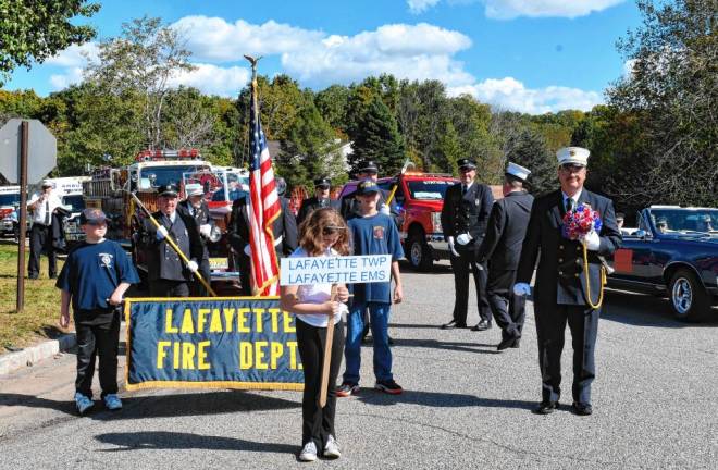 Members of the Lafayette Fire Department gather for the parade.