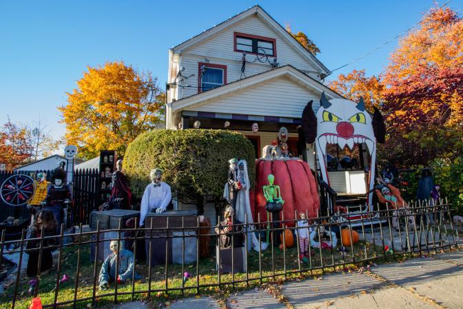 $!<b>A yard on Gariss St. in Port Jervis, NY features an iron-fencing display to contain zombies, skeletons and more, including a large-scale evil clown cut-out with a walk-through mouth at the porch entrance. (Photo by Aja Brandt)</b>