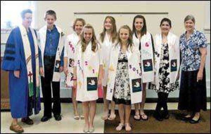 Christian academy holds first high school graduation
