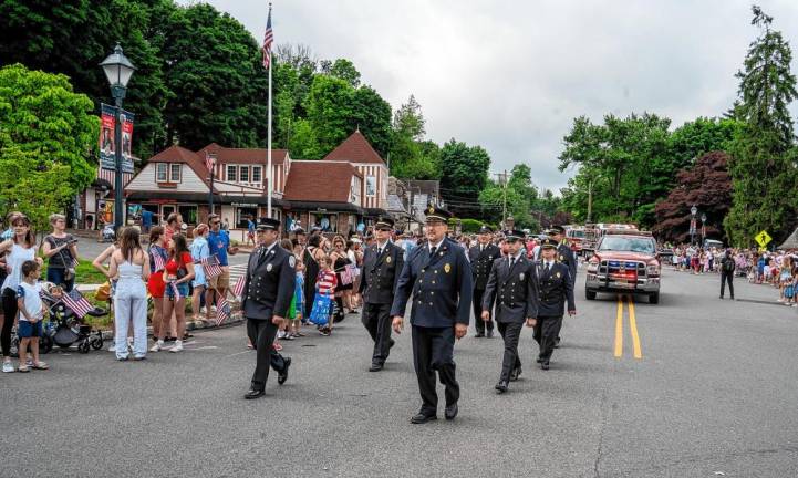 Members of the Sparta Fire Department march in the parade. (Photo by Nancy Madacsi)