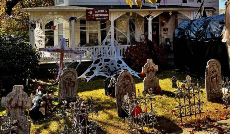 <b>A spooky cemetery filled with tombstones and a tunnel for brave trick-or-treaters awaits on North Church Street, Goshen NY.</b>