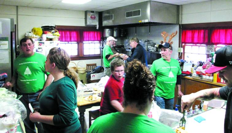 Photo by Viktoria-Leigh Wagner Wantage United Methodist members and volunteers bustling about the kitchen at the First Baptist Church in Sussex.