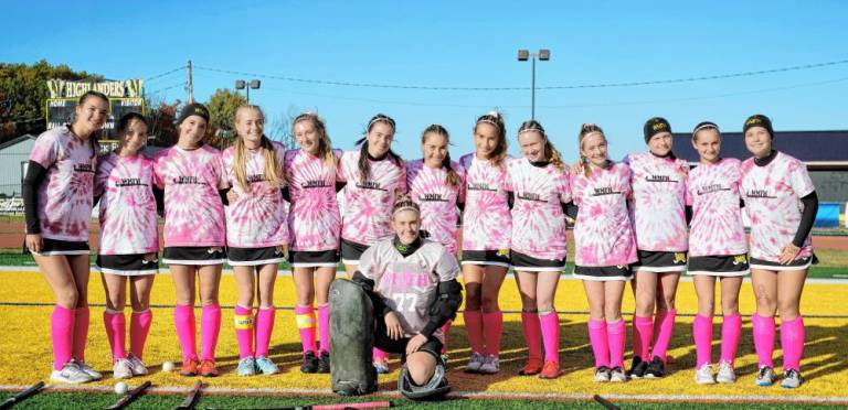 Team honors breast cancer survivors