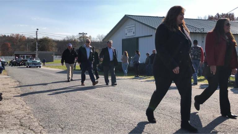 Officials marching in the parade included state Assemblyman Parker Space.