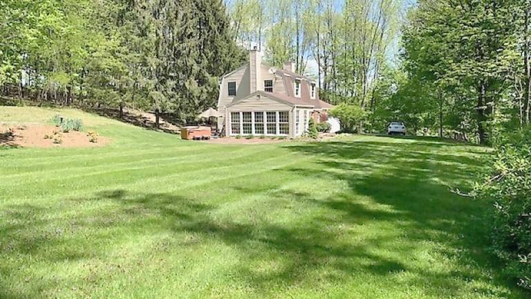 Colonial on 8.5 acres includes horse barn