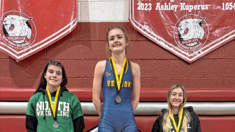 <b>VW1 Senior Lily Henderson wins the 107-pound title in the Hunterdon/Warren/Sussex Tournament on Sunday, Jan. 5. (Photos provided)</b>